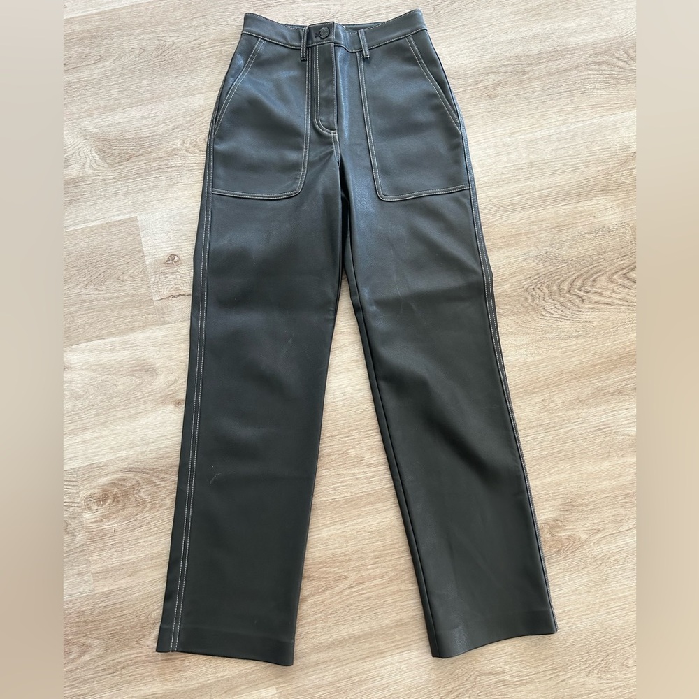 Black aritzia faux leather pants with white stitching